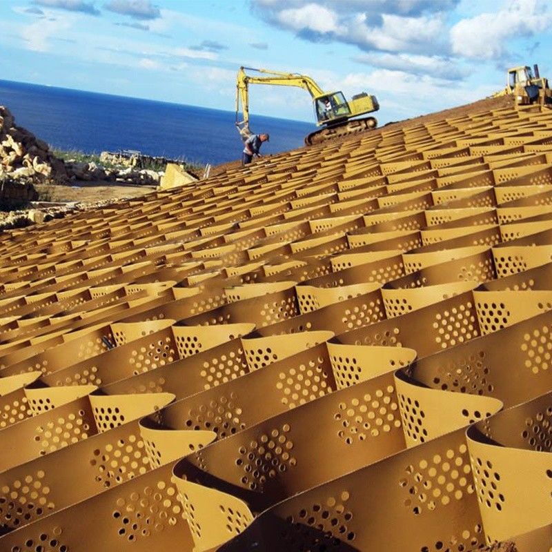 HDPE Geocell Gravel Soil Stabilizer محطة وقوف السيارات شبكة العسل البلاستيكية الشبكة العشبية الشبكة للطريق الخرساني