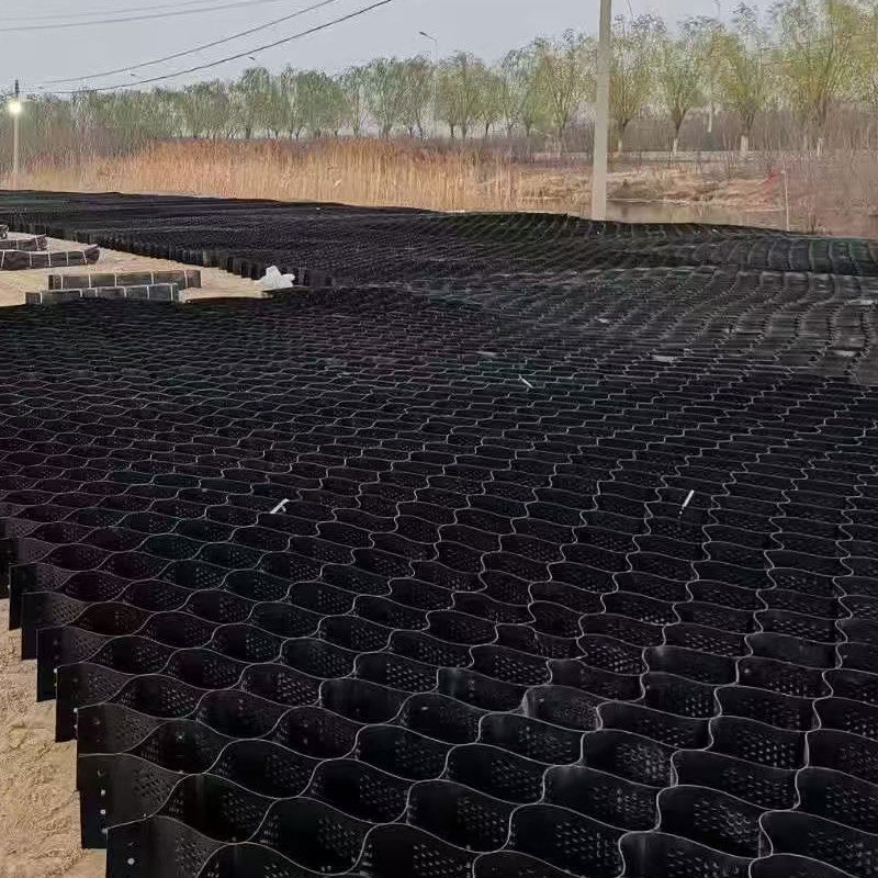 شبكة قرص العسل البلاستيكية عالية الكثافة (HDPE) ذات الملمس والمثقبة لتثبيت الحصى للطرق