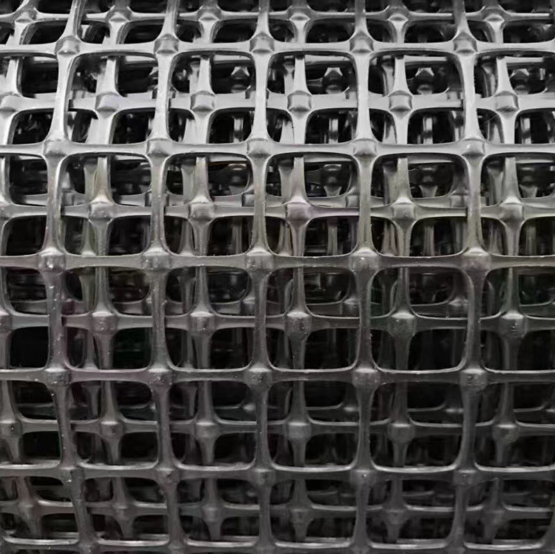 الشبكة الجيولوجية البلاستيكية الثنائية المحورية لتعزيز التربة ، قوة الشد العالية PP / PET الشبكة الجيولوجية ، Balck 30kN / m ، شبكة استقرار قاعدة الطريق